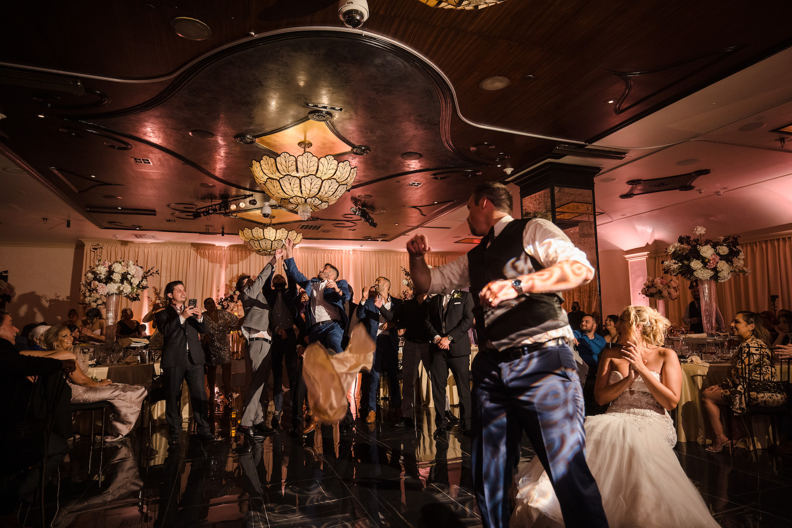 ActionPacked Bouquet and Garter Toss Photos Wedding Maps