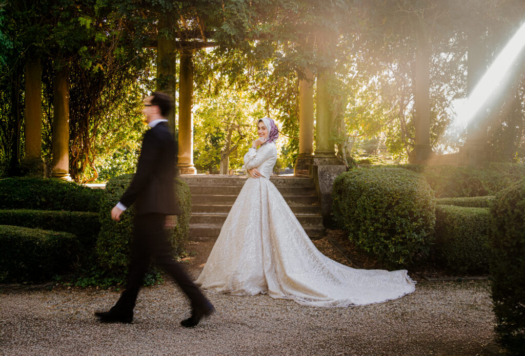 Second blurry wedding portrait by Green Apple Weddings with soft atmospheric motion blur