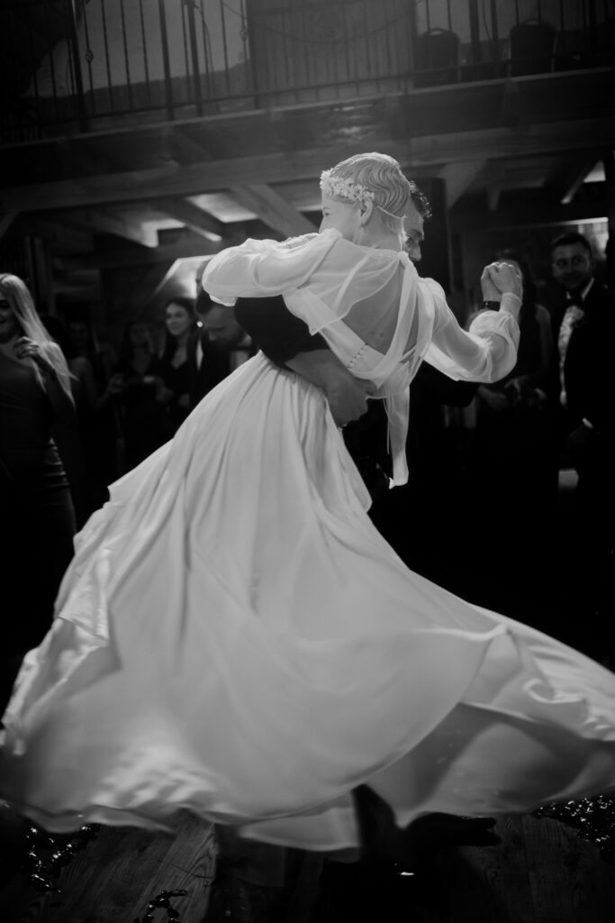 Black and white wedding portrait with intentional blur, soft focus, and film grain by David Bowles of Brush and Feathers