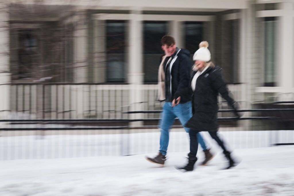 Off-center wedding composition with motion blur and negative space creating visual tension by Gretchen Troop